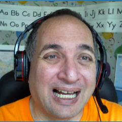 David Beroff laughing in the classroom