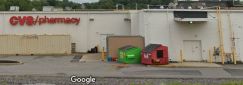 garbage bins and HVAC behind Carbondale CVS